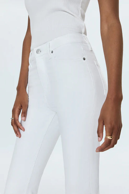 side view of model wearing lennon high rise crop bootcut jeans in vivid white by pistola