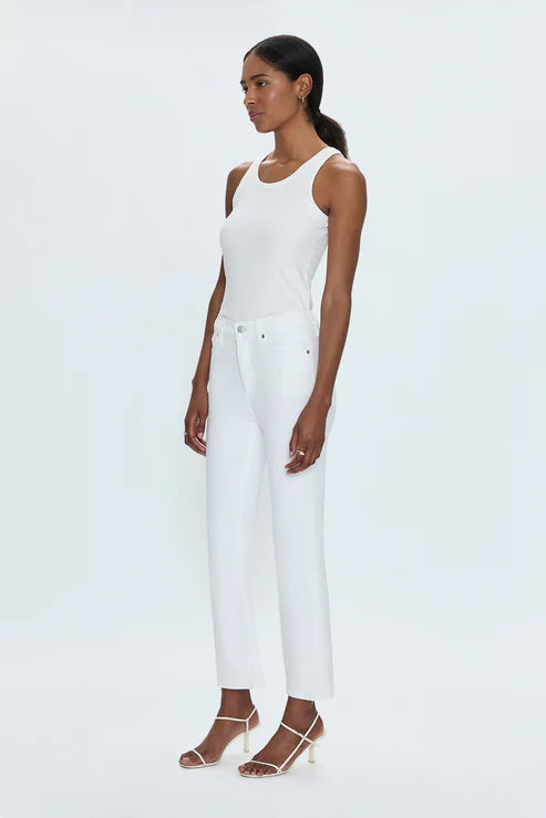 model wearing high rise lennon crop jeans in vivid white by pistola