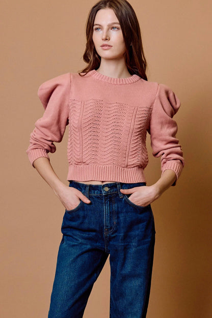 savvy | retail therapy woman wearing a blush colored cotton sweater styled with jeans for fall. 