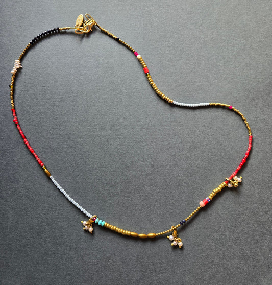 Beaded Charm Necklace with Charms in lab ruby by Meredith Waterstraat