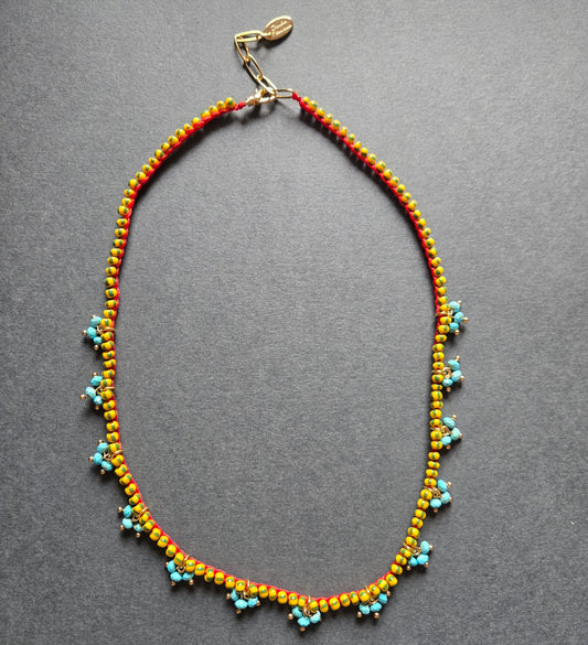 Beaded Charm Necklace with Turquoise in gold by Meredith Waterstraat