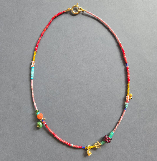 Simple Beaded Charm Necklace in red by Meredith Waterstraat
