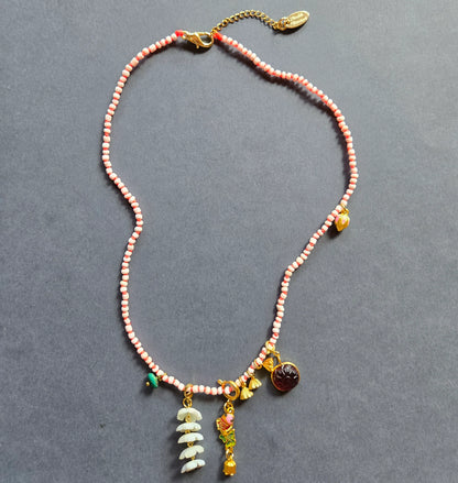 Beaded Charm Necklace in pink by Meredith Waterstraat
