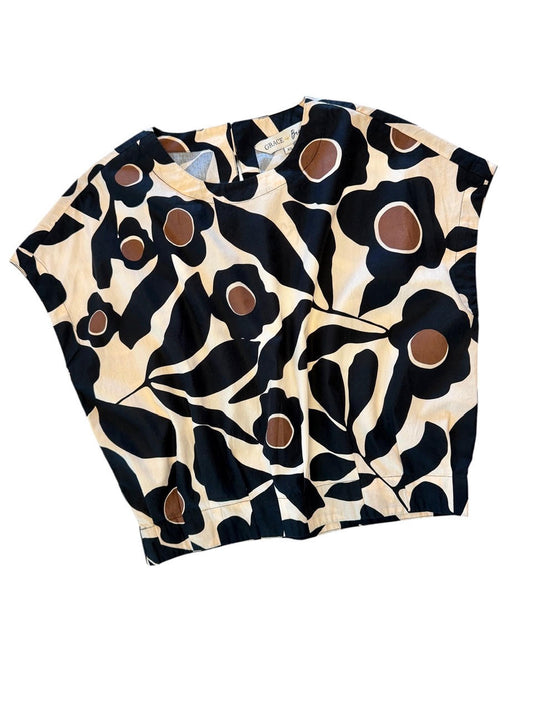 short sleeve top in featuring  floral pattern in black, brown, and cream