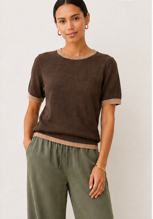 Model wearing SavVy | Retail Therapy Dera short sleeve sweater in dark roast with mocha and tan contrast trim