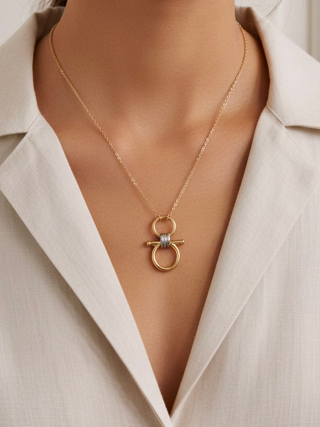 savvy | retail therapy gold mixed metal necklace on model paired with tan button down 