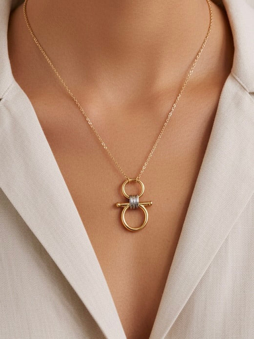 savvy | retail therapy gold and silver take the reins necklace by farrah b jewelry 