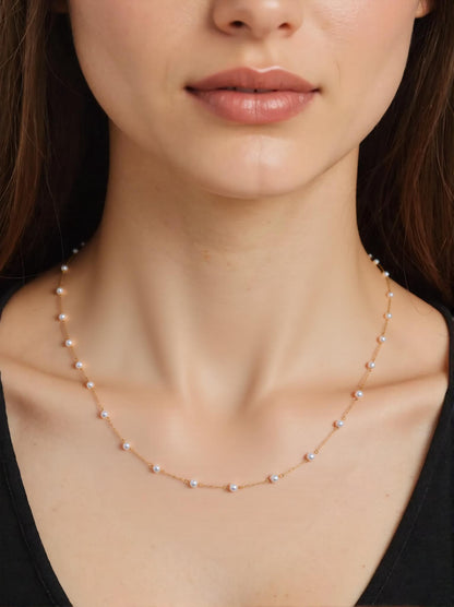 savvy | retail therapy dainty gold and pearl necklace on model 