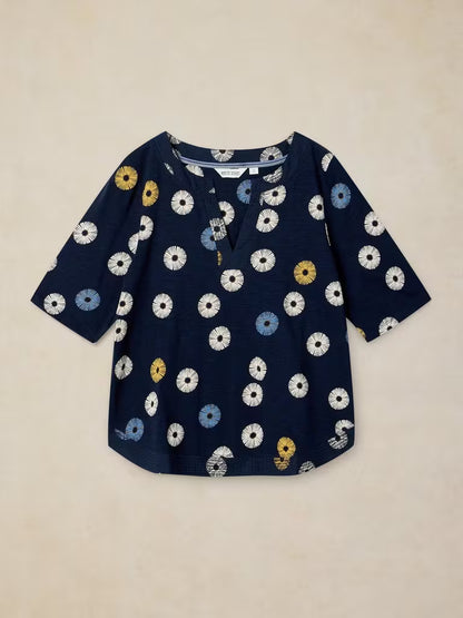 SavVy | Retail Therapy printed navy v-neck 3/4 length sleeve t-shirt laying flat against white background