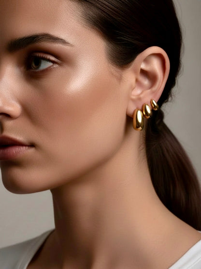 savvy | retail therapy triple threat gold earring stack on model 