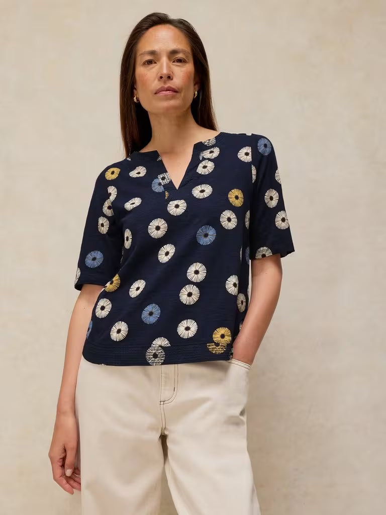 SavVy | Retail Therapy weaver notch top in navy print on model 