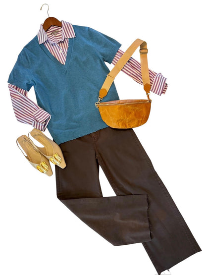 Savvy | retail therapy womens blue sweater styled with a liliac striped button down shirt and brown jeans