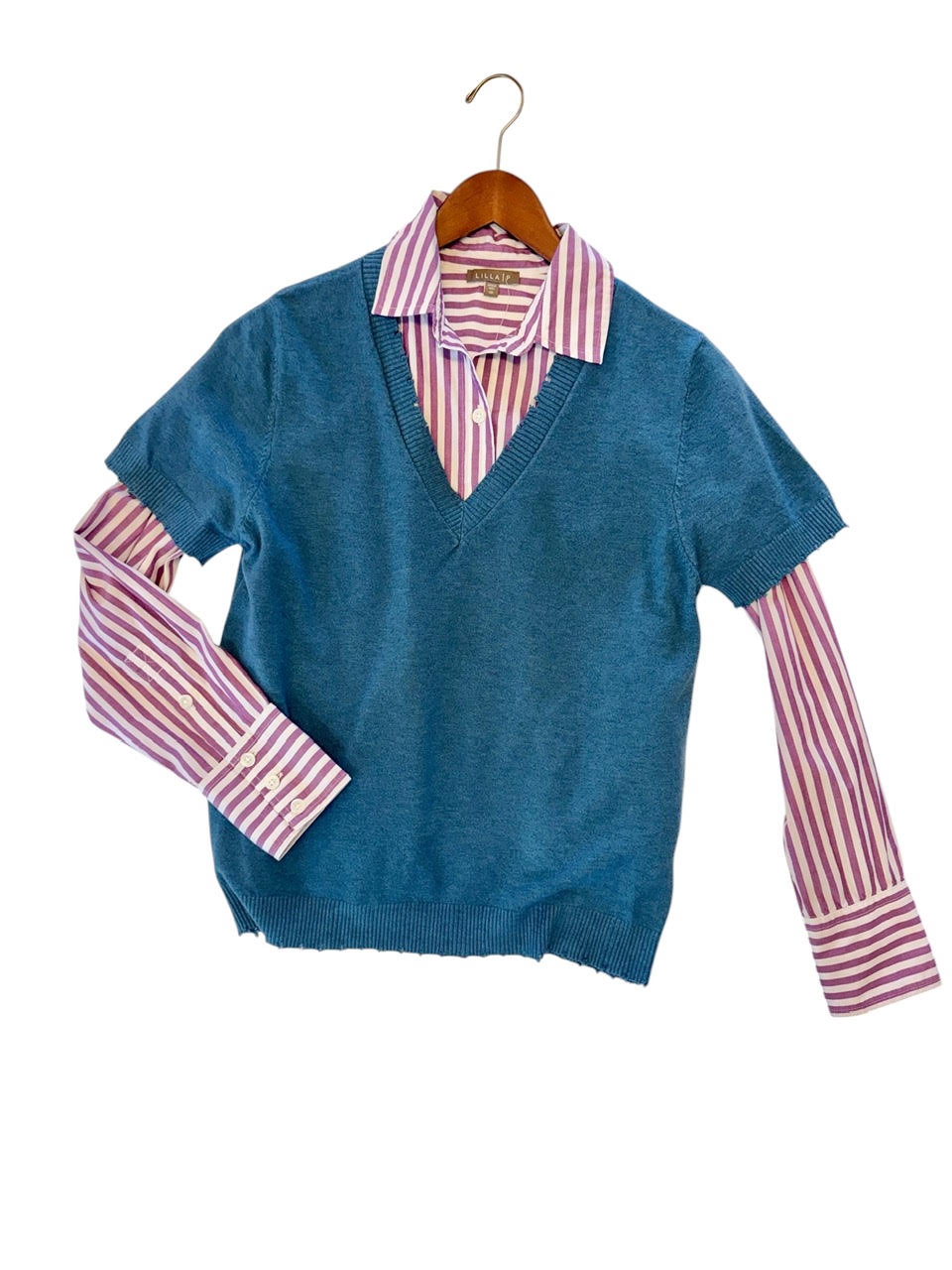 savvy | retail therapy blue v-neck sweater layered over a lilac stripeed button down blouse 