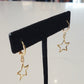 Star Huggie Earrings in gold by Farrah B