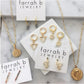 Open Triangle Huggies in gold by Farrah B