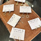 Star Huggie Earrings in gold by Farrah B